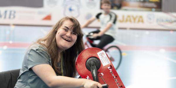 Young girl on an adapted bike  