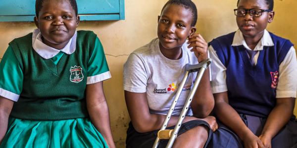 Vanessa sits with school friends
