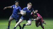 Oxford's Euan Friend tries to evade the Army defence. Hooker Joshua Navarajasegaran in support