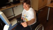 Gloucestershire House resident Rebecca Oliver on an adapted bike
