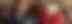 Two women in Christmas jumpers and Santa hats laughing