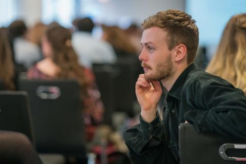 Change 100 intern looking to his left