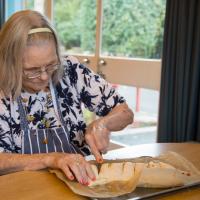 Resident baking at Ashwood