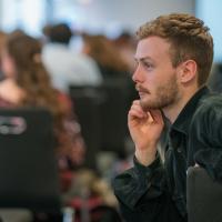 Change 100 intern looking to his left