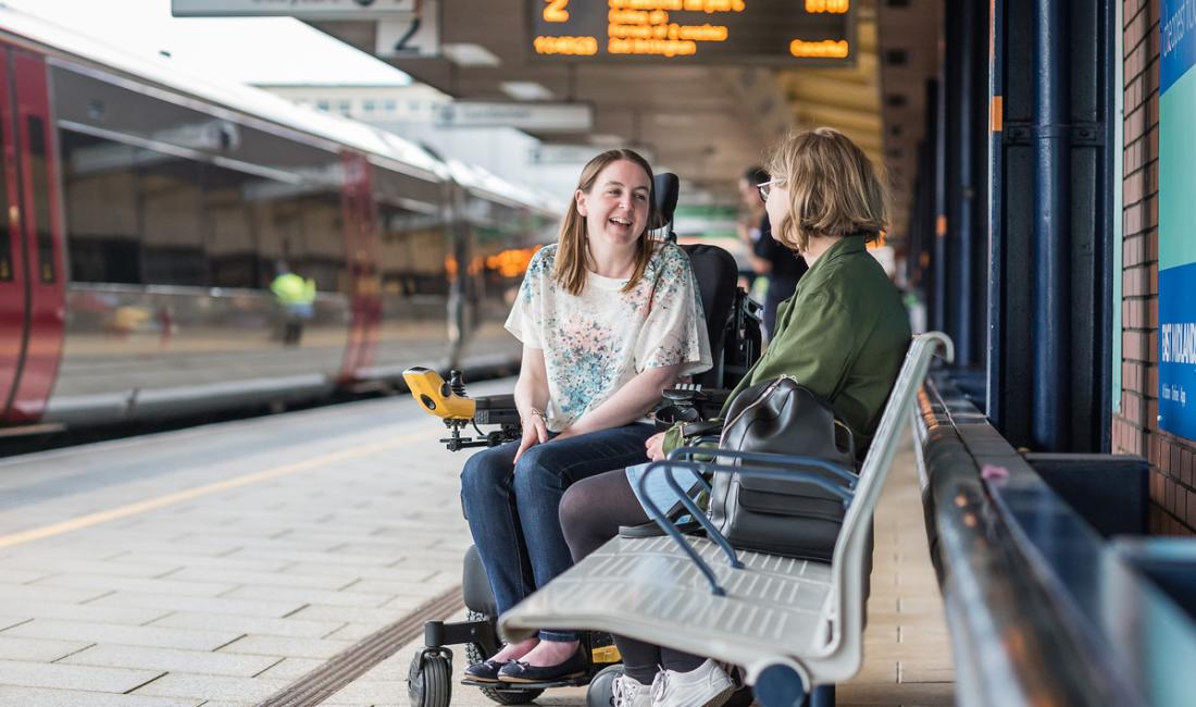 Anna, an accessible transport campaigner, with Danielle Mendel, External Communications Office, chatting on the platform of Leicester train station