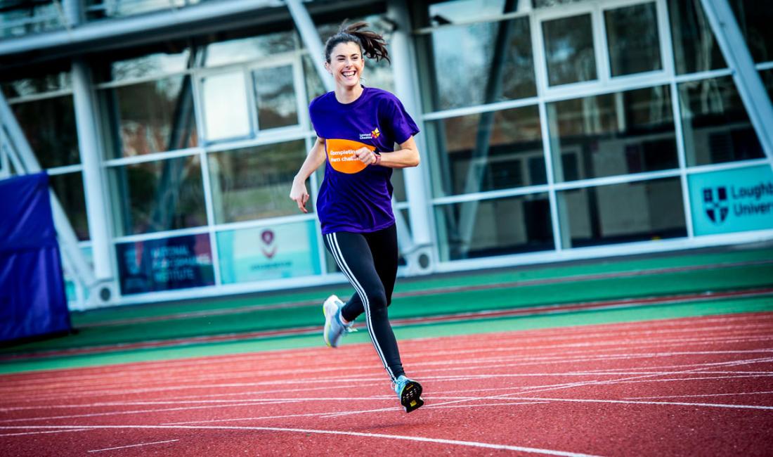 Olivia Breen running on a race track